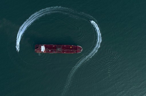 Speedboats from Iran's Revolutionary Guard circle the British-flagged oil tanker Stena Impero on Sunday, July 21, 2019 in the Iranian port of Bandar Abbas, after it was seized in the Strait of Hormuz two days earlier
