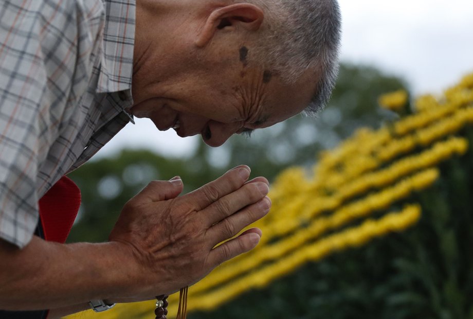 A man prays in front of the cenotaph for A-bomb victims at the Peace Memorial Park in Hiroshima, on Aug. 6, 2019, as the western Japan city marked the 74th anniversary of the U.S. atomic bombing. 